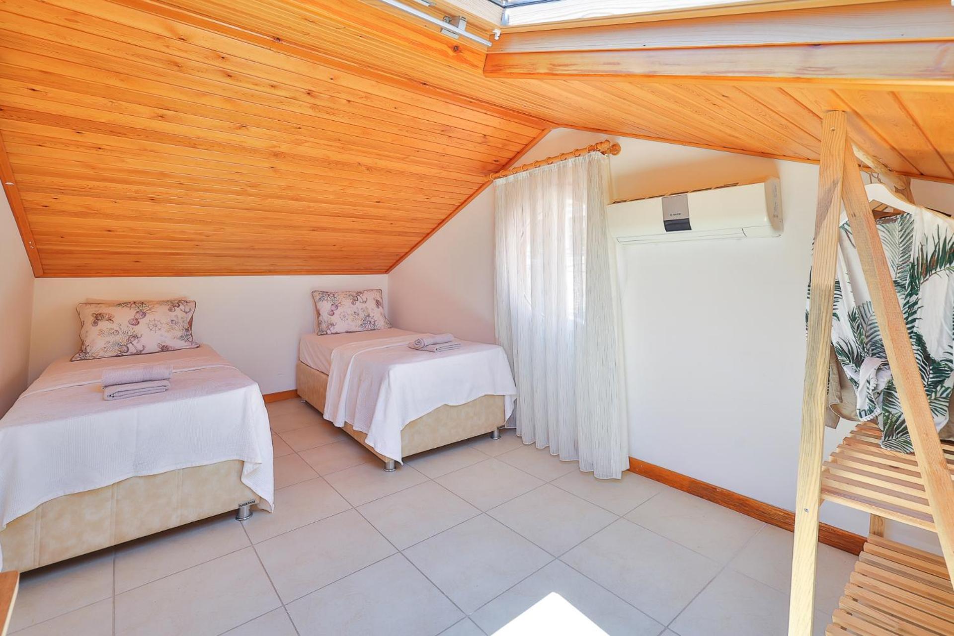 Apollo Apart Kaş Luaran gambar